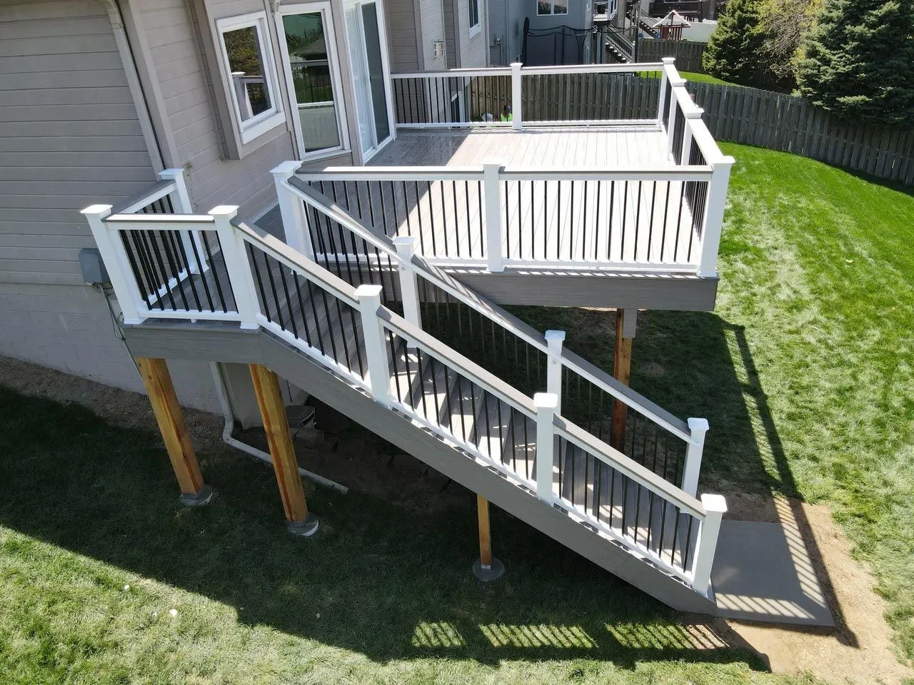 Frost resistant deck footings on a finished custom deck built by Big Pine Decks near Omaha, NE