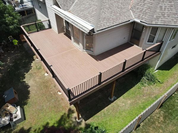 TimberTech deck with custom pergola, outdoor kitchen area, and aluminum railing, Omaha, NE