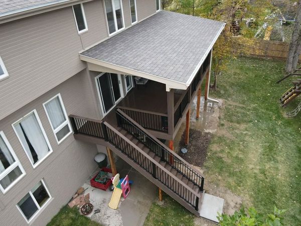Pool surround deck in composite decking with slip-resistant surface and low railing, Omaha, NE