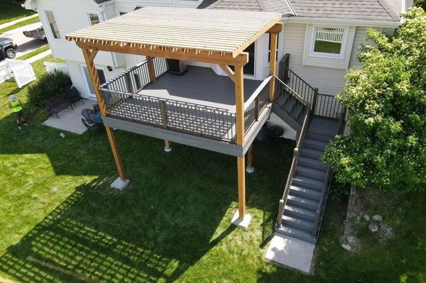 Multi-level composite deck with fire pit seating area and cable railing, Gretna, NE