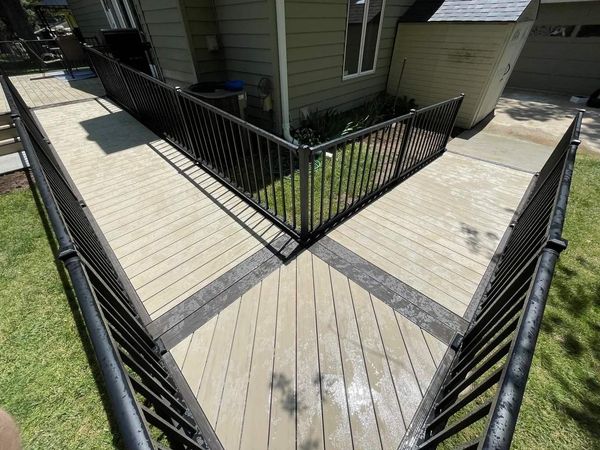 Two-tier cedar deck with connecting staircase and aluminum baluster railing, Ralston, NE