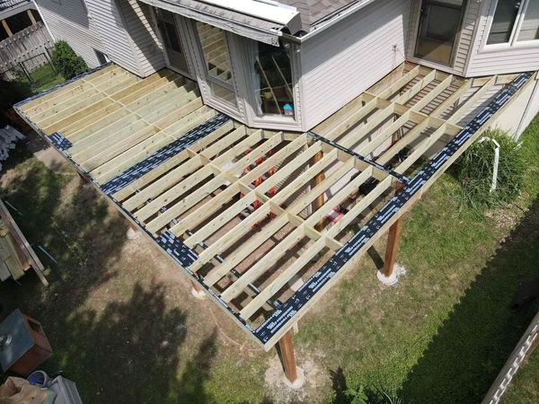 TimberTech composite deck with powder-coated cable railing and surface-mount deck lighting, La Vista, NE