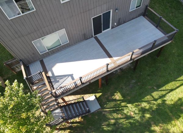 Trex Transcend deck with contrasting fascia boards, hidden fasteners, and tempered glass panel railing, Ralston, NE