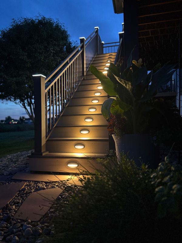 TimberTech Vintage Weathered Teak composite deck with steel cable railing and LED step lights, Papillion, NE